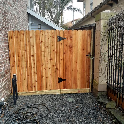 Cedar gates on gravel