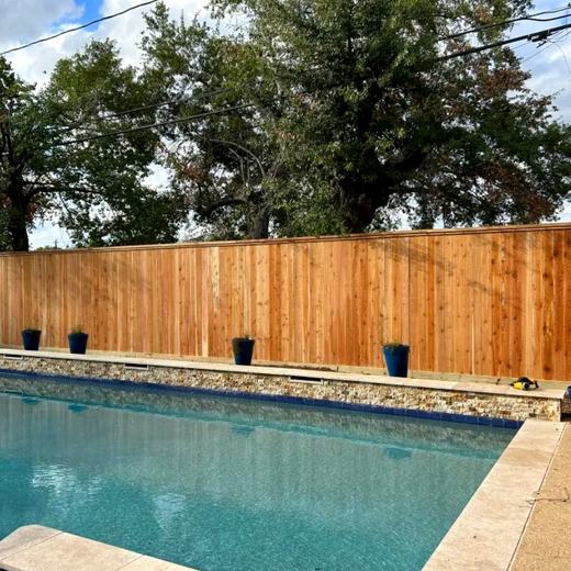 Cedar fence behind the pool