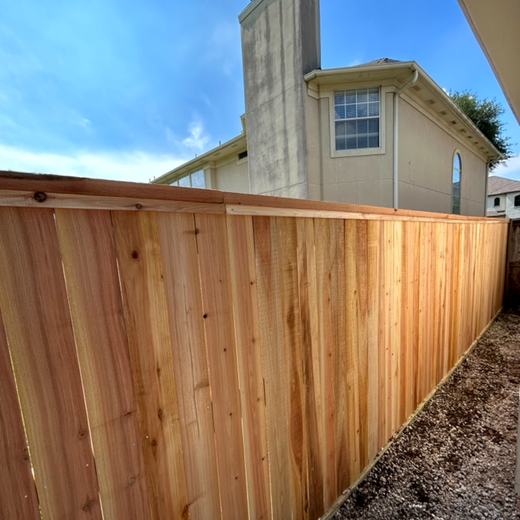 Cedar with cap rail, gravel bed