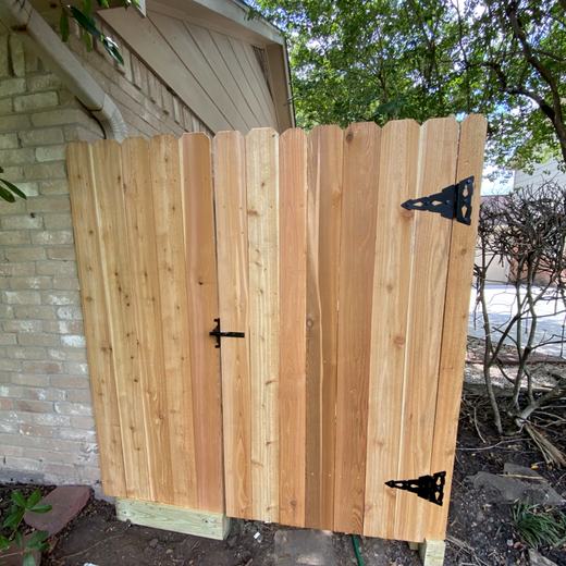 Double cedar gate, brick opening