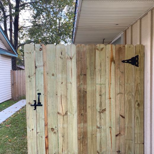 Gate tucked under the eave