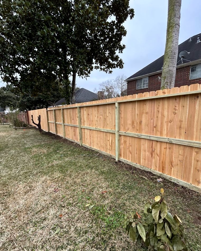 Finished fence run with pickets up