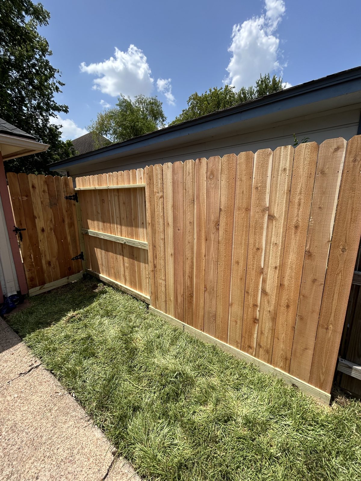 Finished cedar gate and side yard fence