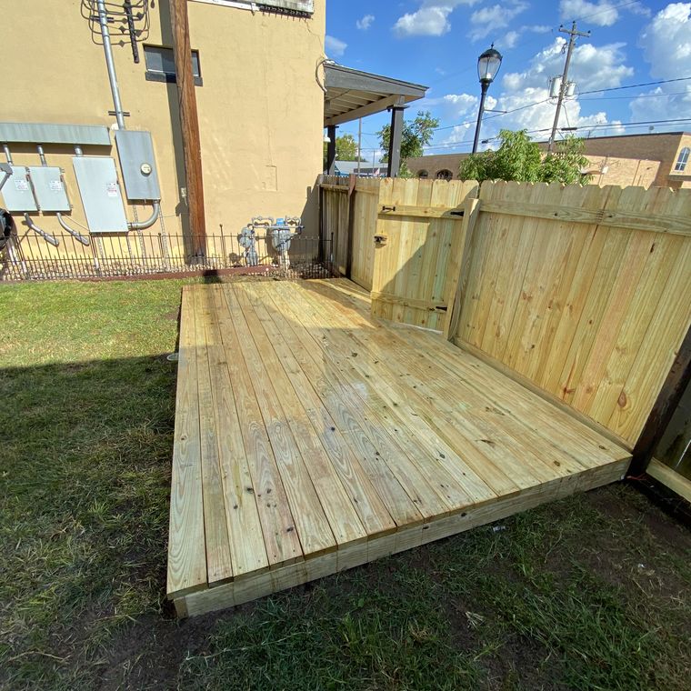 Finished backyard deck built by L&K
